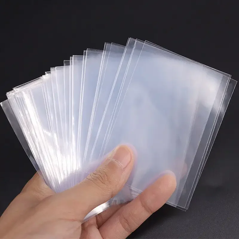 300/100Pcs 66*91mm Card Sleeve - огляд і ціна Card Sleeves Protector